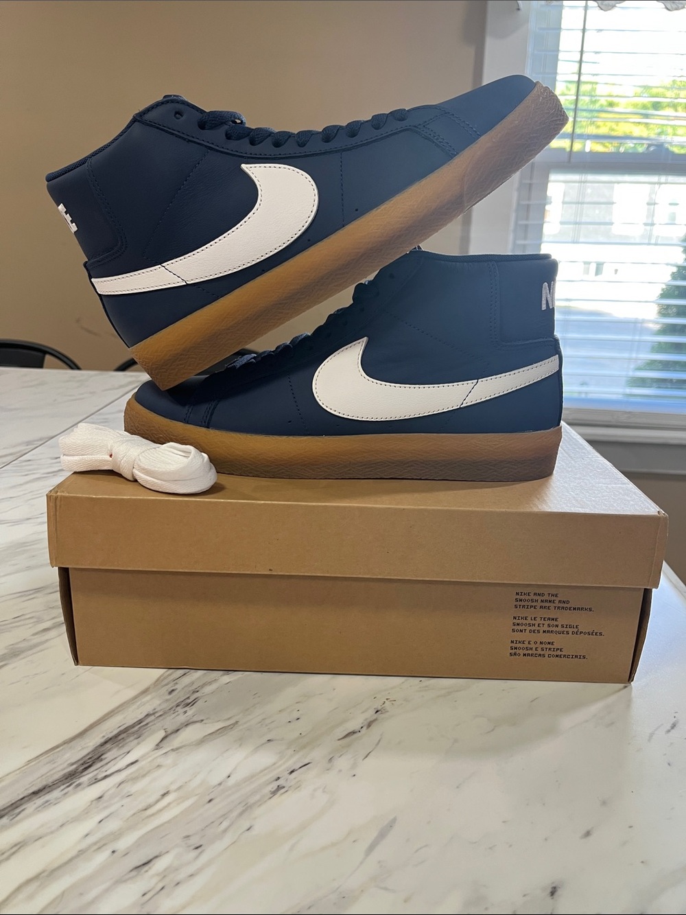 Nike SB Blazer Mid in Navy with White Swoosh and Gum Sole xtra laces